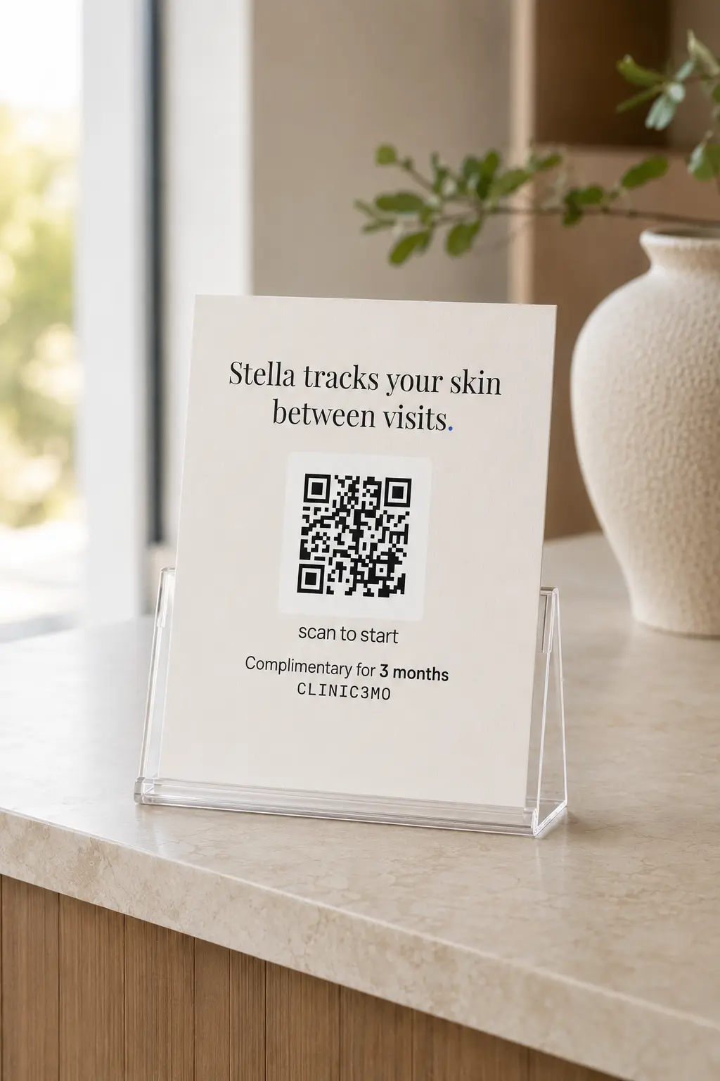 A printed Stella gift card in a stand on a clinic reception desk