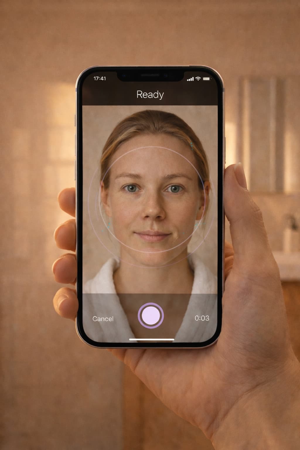 Hand holding iPhone showing Stella skin scanning app in use