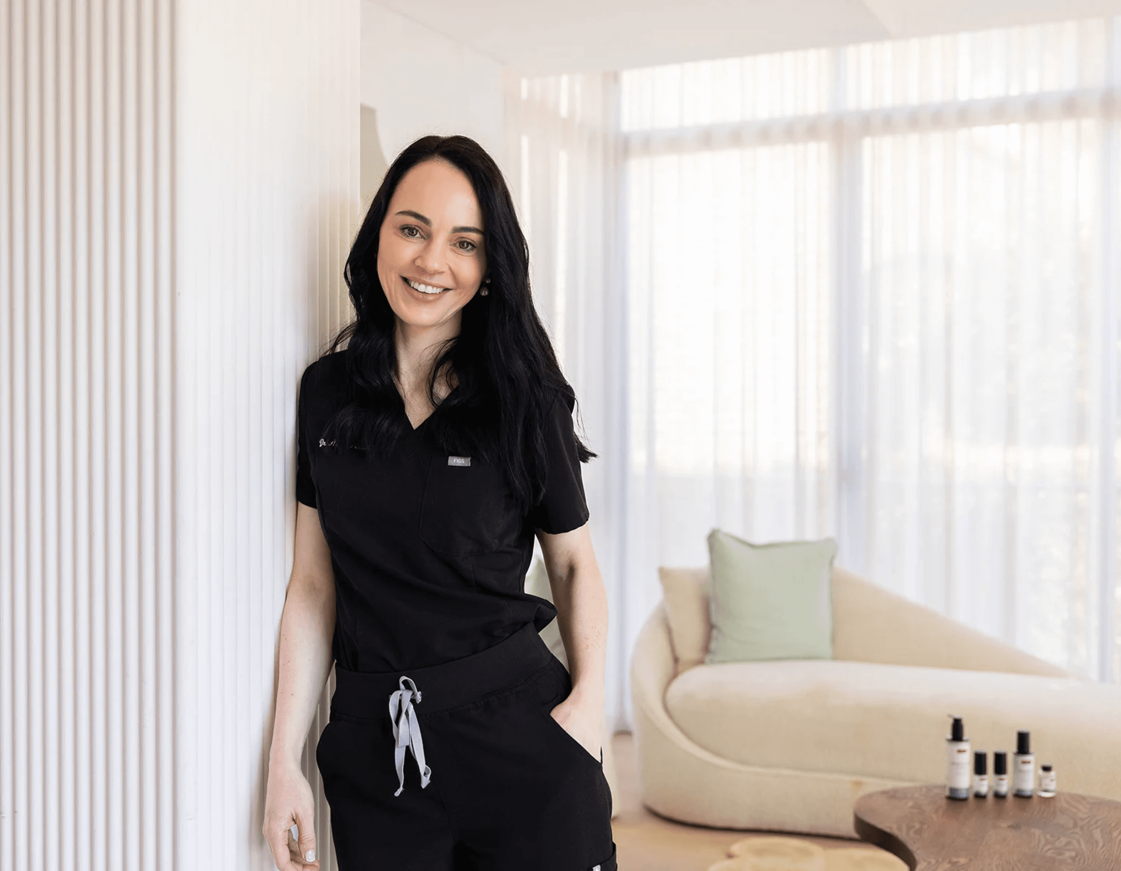 Dr Alice Rudd standing in her dermatology clinic